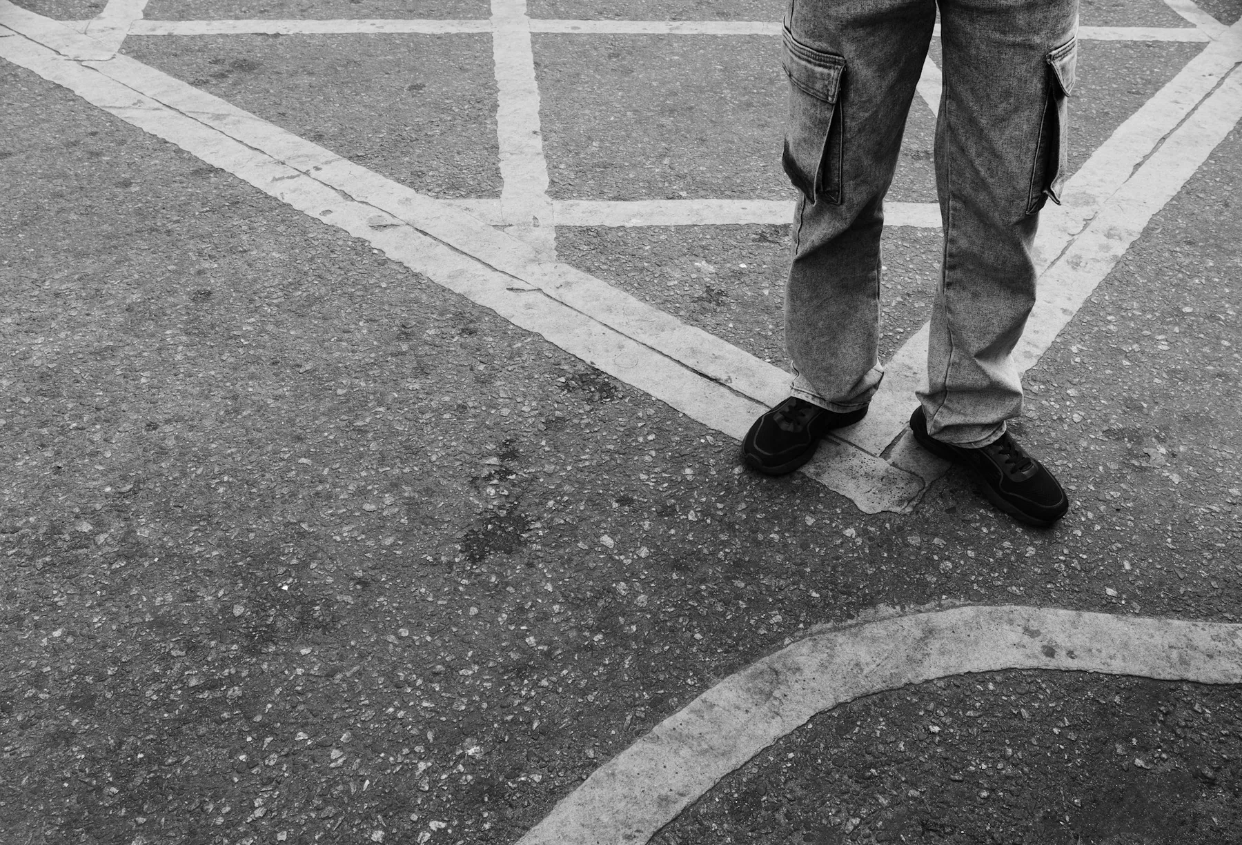 Man in a graphic print t-shirt on a street