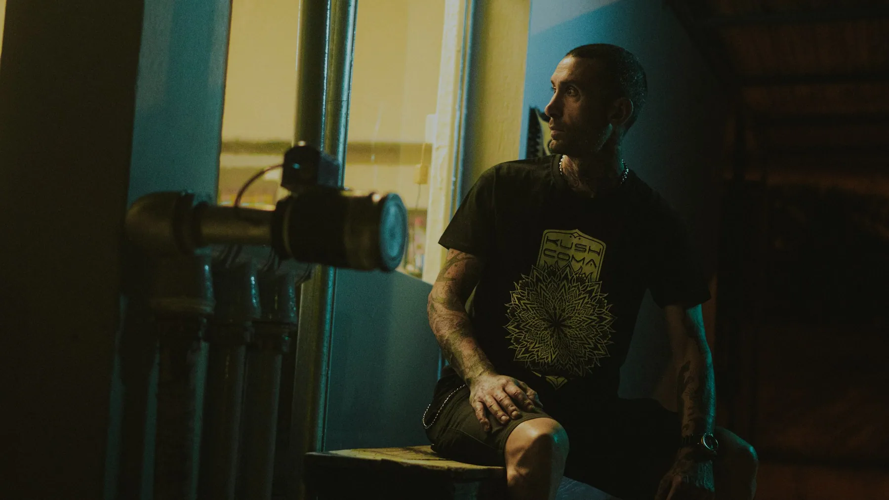Athlete training in a low-lit gym