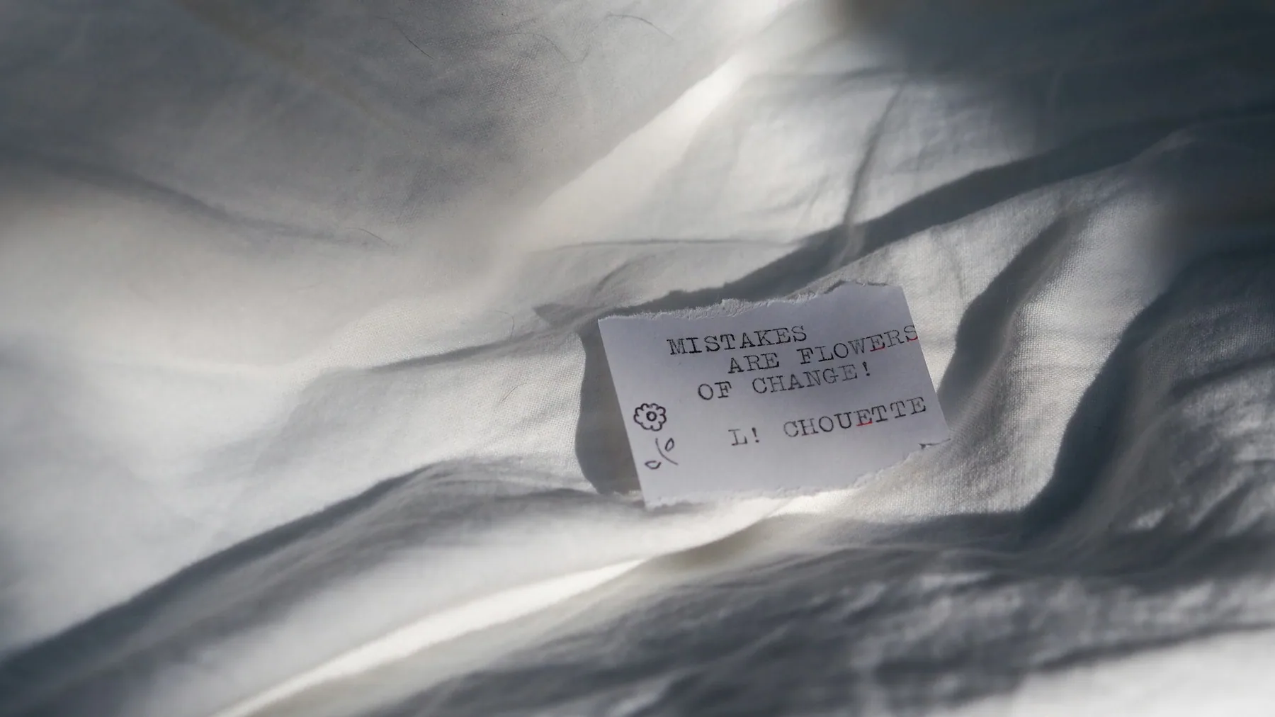 Close detail of a dark garment care label