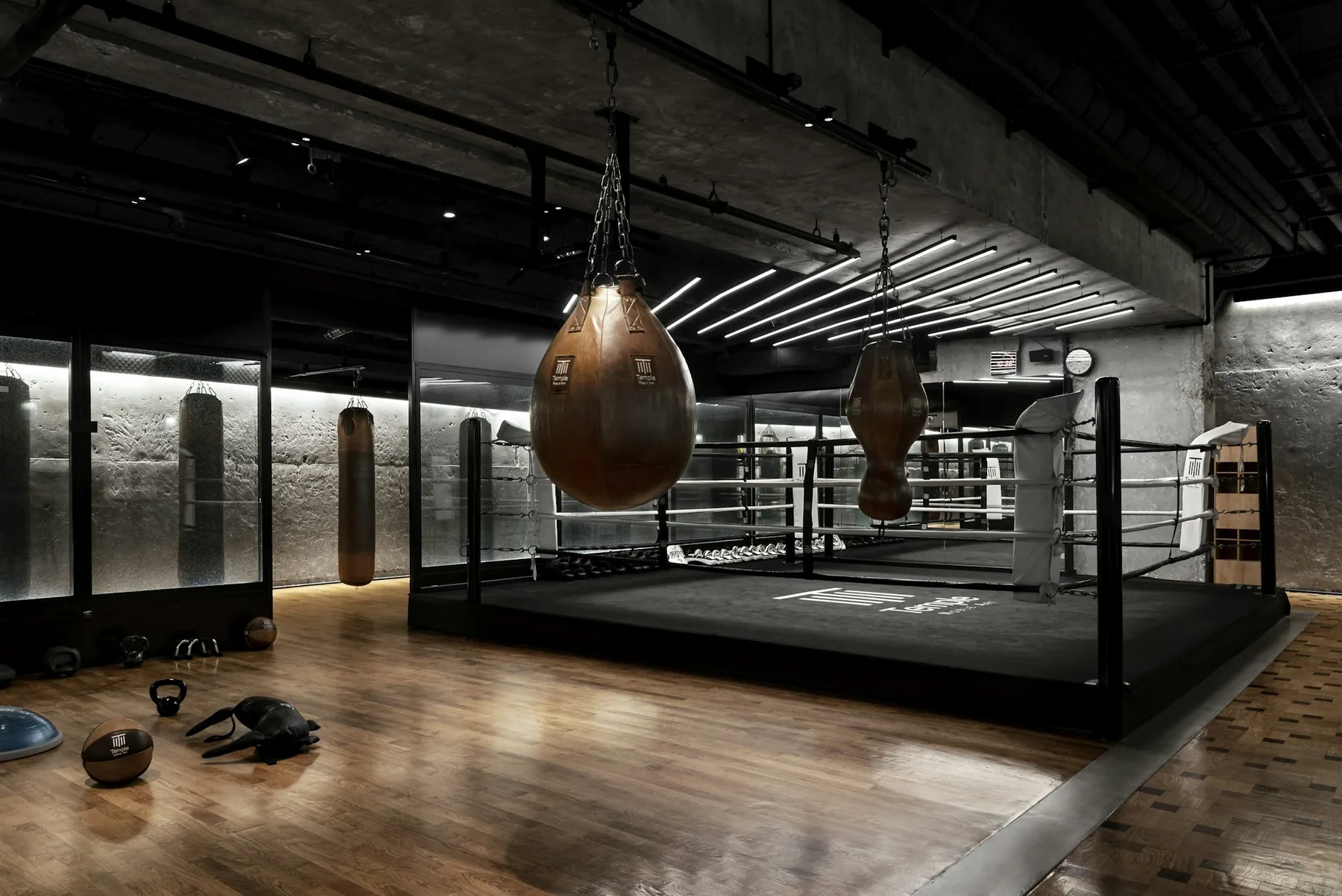 A single dumbbell on a dark background