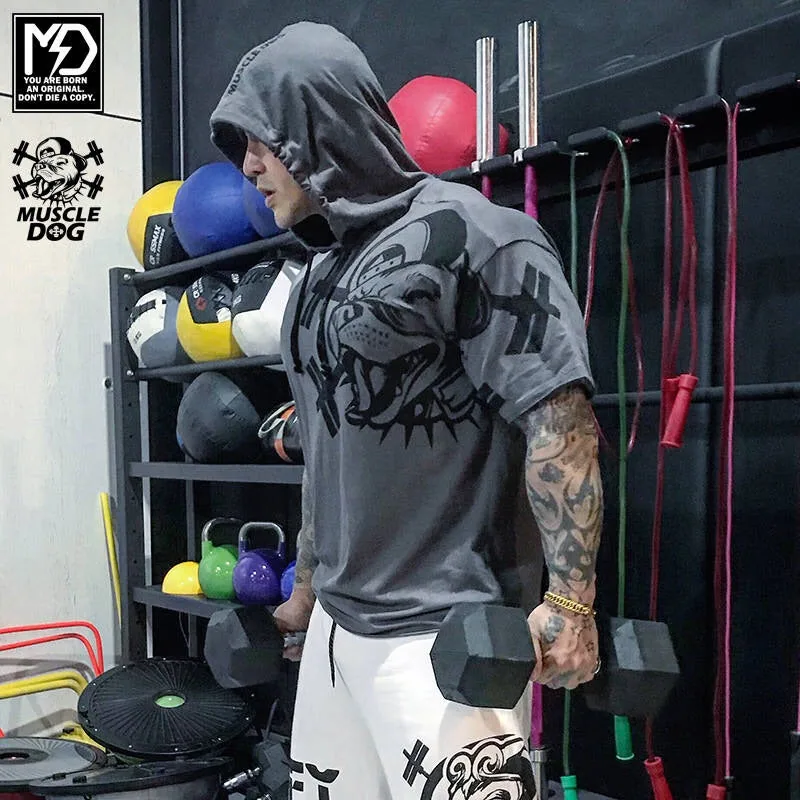 Athlete in MuscleDog apparel against a MuscleDog painted wall