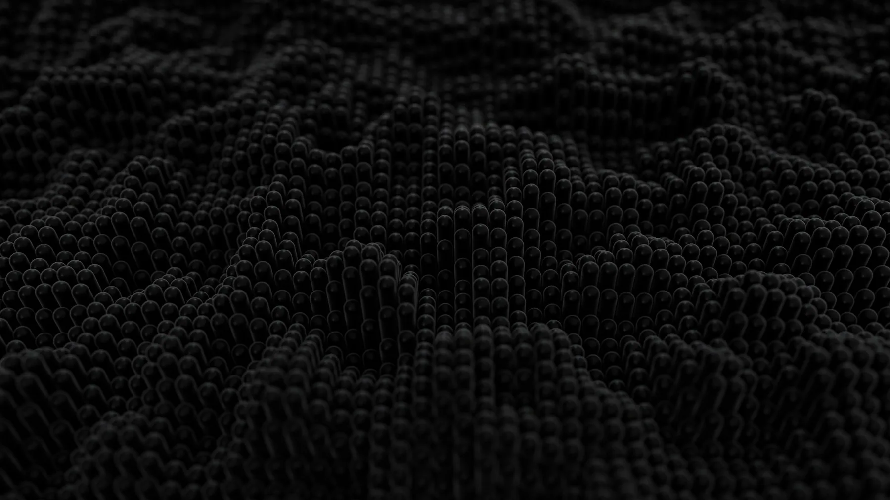 Close detail of frayed dark fabric