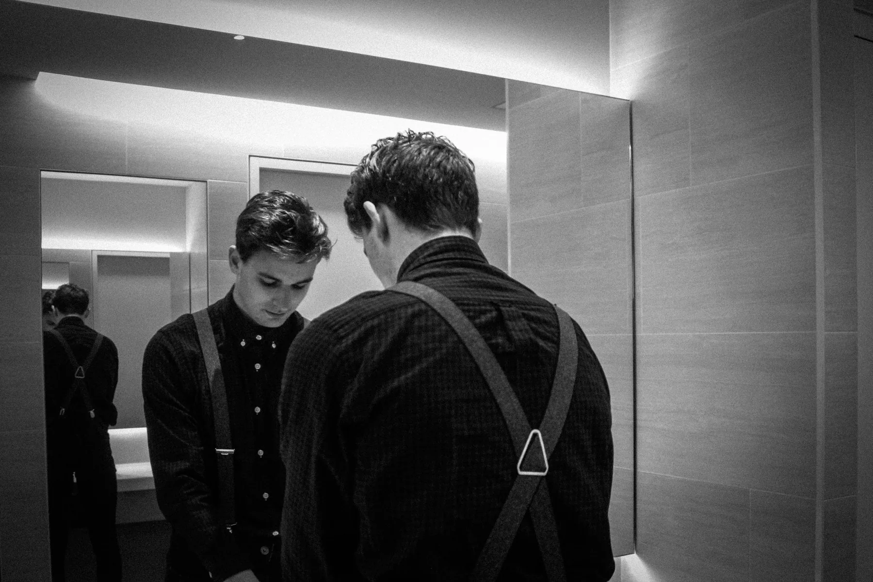 A fitting room photographed in black and white