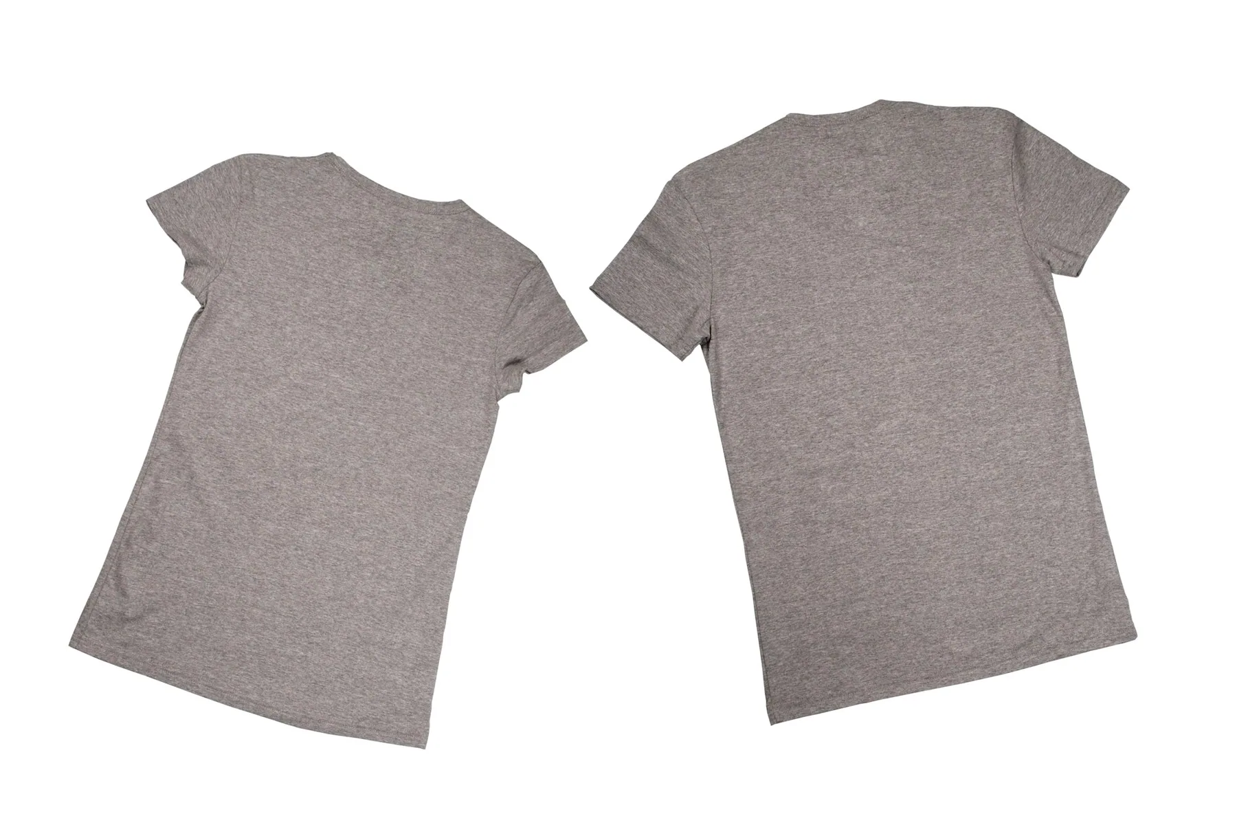 Two grey t-shirts laid flat for measuring