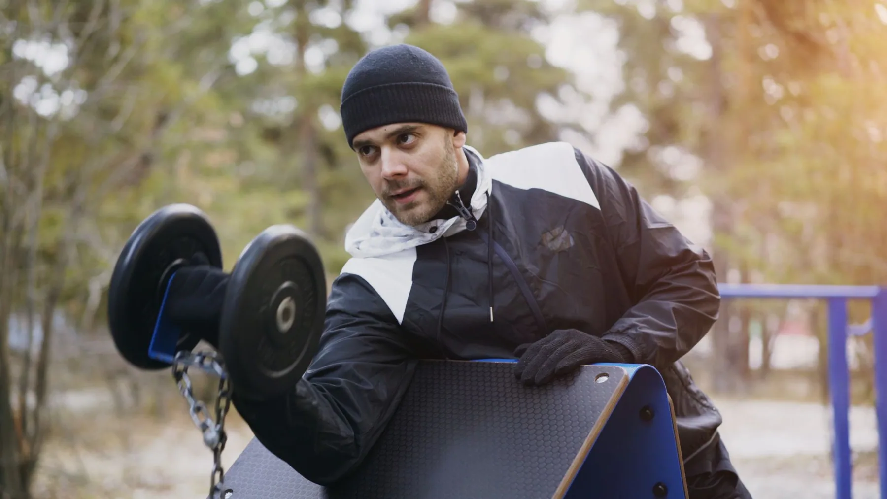 Athlete training outdoors in cold weather wearing a beanie