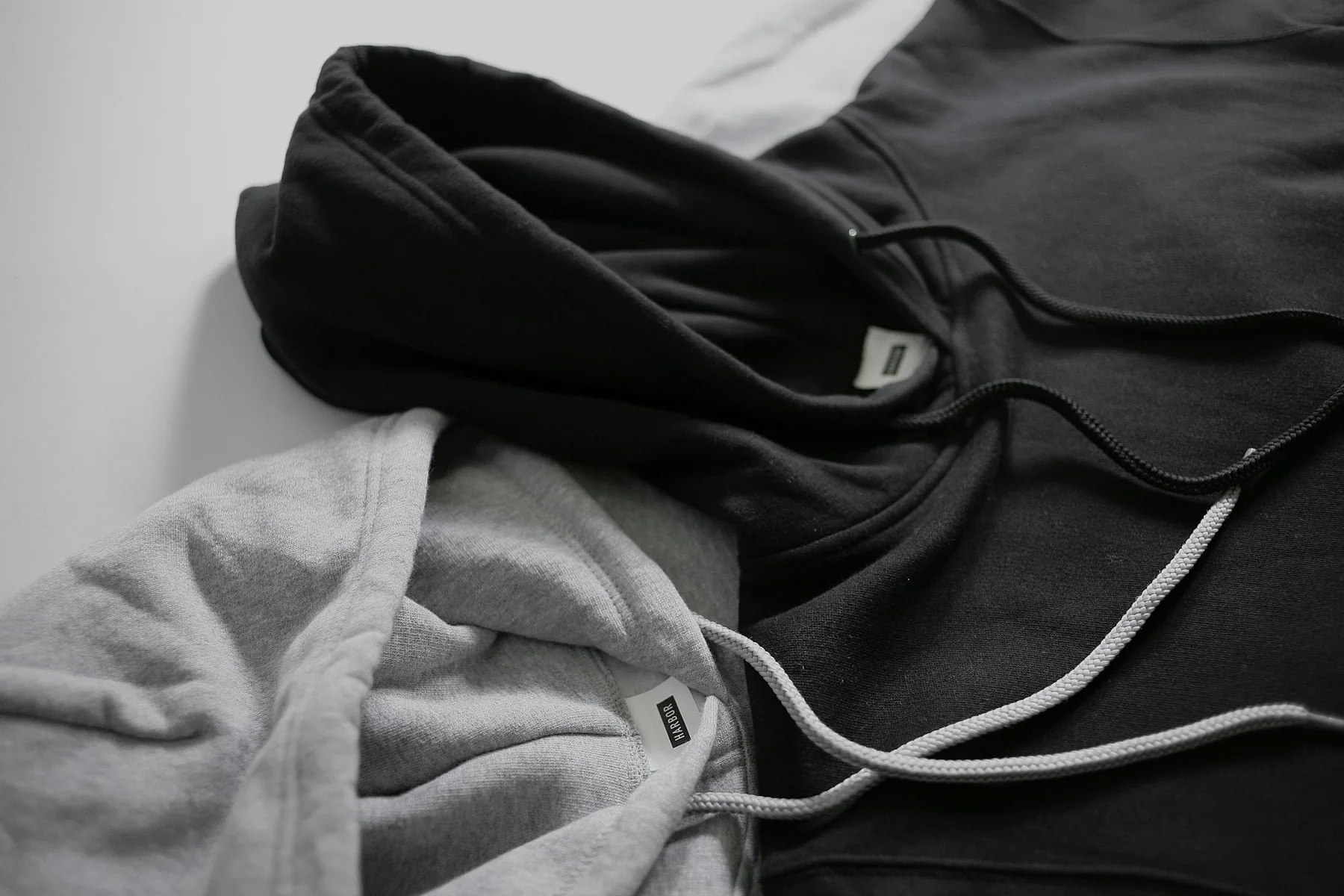 Close detail of a black hood and drawcord