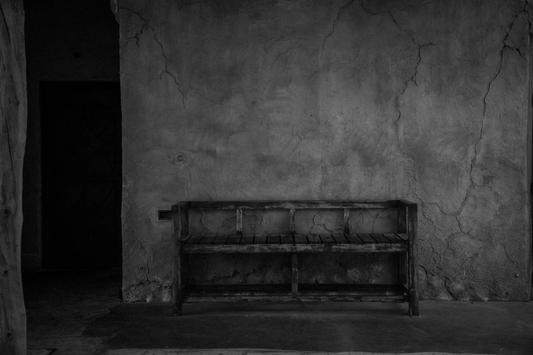 Empty bench in a dark gym interior