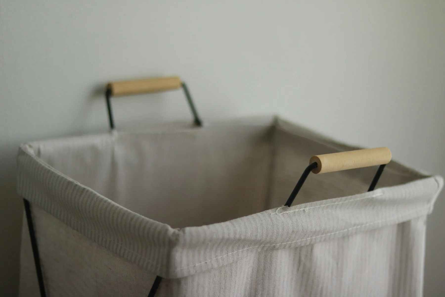Folded garments in an open drawer